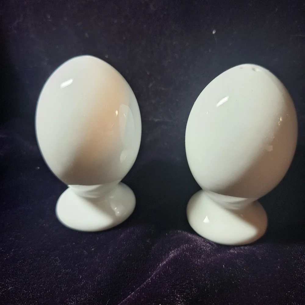 Porcelain white salt and pepper eggs